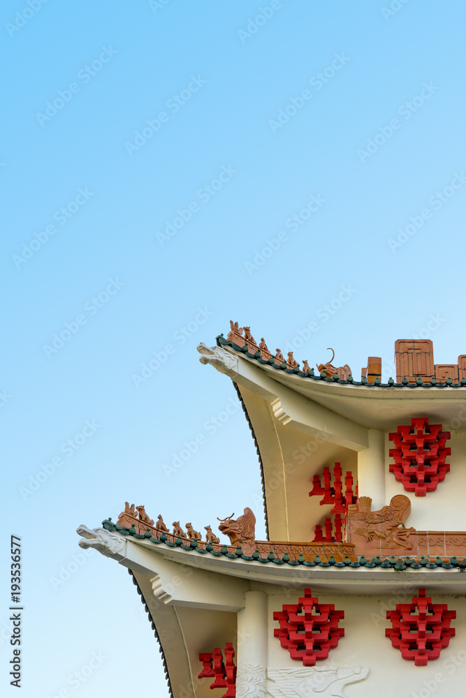 Modern building with chinese-inspired architecture featuring curved ...