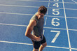 © Jacob Lund - Sprinter walking on running track