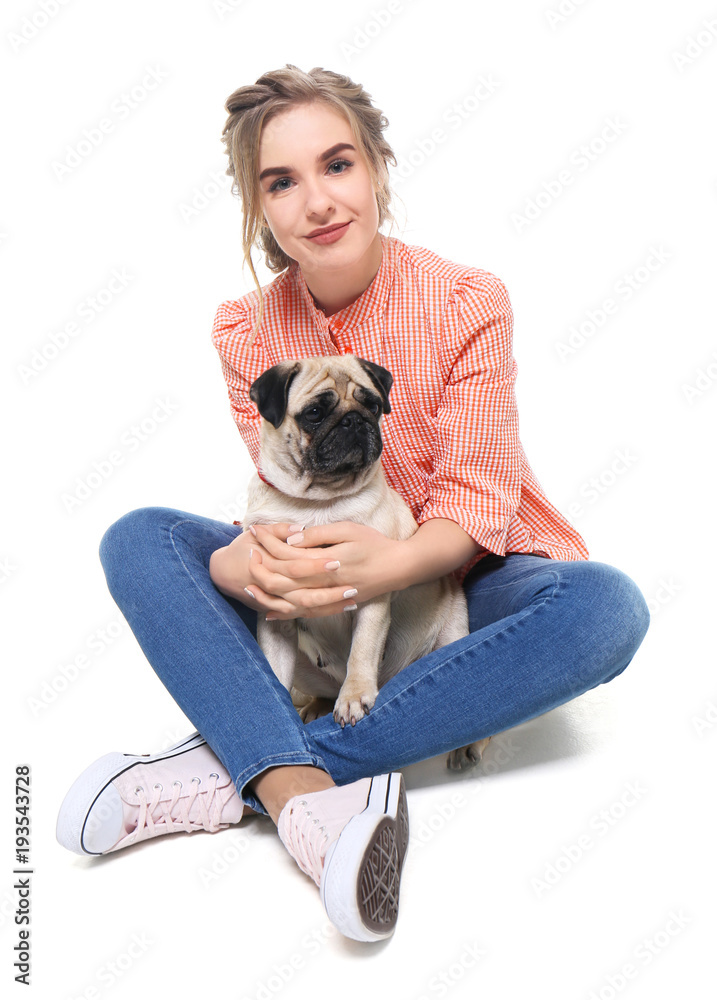 Young woman with cute pug dog on white background. Pet adoption