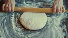 Rolling Dough With Rolling Pin For Baking