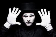 Mime Showing Hands Isolated On Black