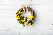Easter Background With Spring Wreath Hanging On Door