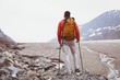 © Wavebreak Media - Male hiker standing with backpack on a sunny day