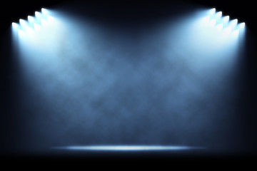 rows of side spotlights illuminating empty stage