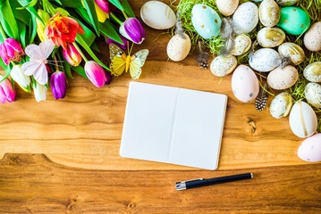 Wall Mural - blank notepad with free copyspace and easter and spring decorations from above