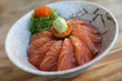 Salmon sushi don on wood background , Japanese food
