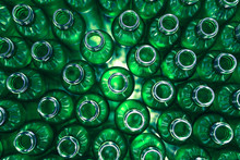 Bottling Plant - Green Glass Bottles From Above. Abstract Background.