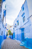 Fototapeta Uliczki - Beautiful street of blue medina in city Chefchaouen,  Morocco, Africa.
