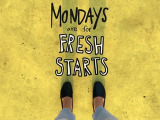 Mondays are for fresh starts word and woman leather shoes background