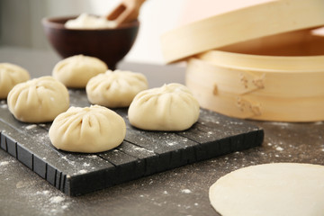 Wall Mural - Raw baozi dumpling on white background