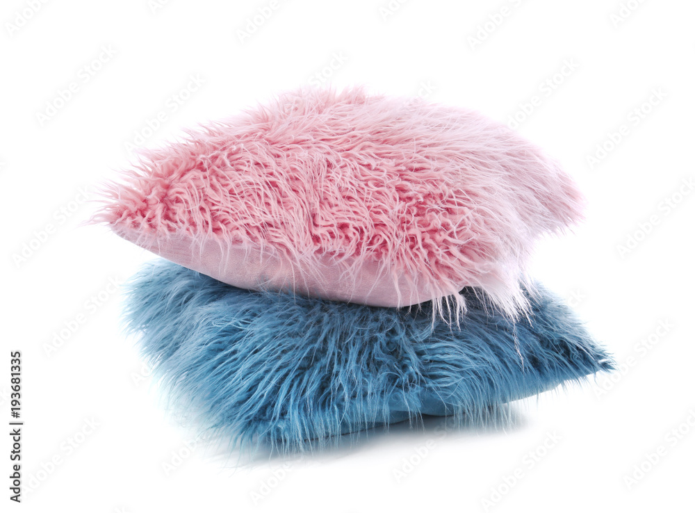 Two fluffy pillows on white background