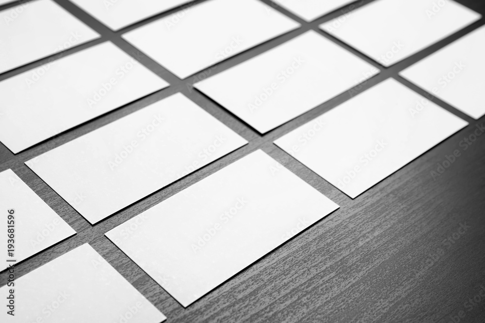 Blank business cards on grey background