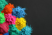 Colorful Powders For Holi Festival On Dark Background