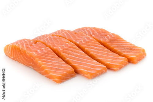Cuadros en Lienzo Fresh salmon fillet with basil on the white background.