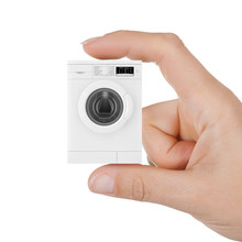 Closeup Woman Hand With Modern White Washing Machine.