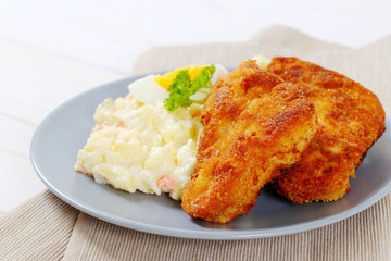 Canvas Print - schnitzels with potato salad