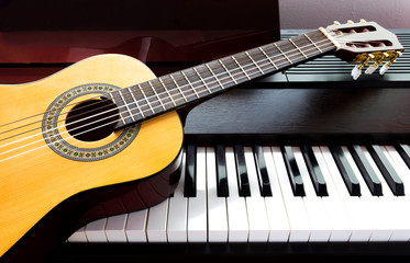 Guitar and piano. Music instrument. Art and music background.