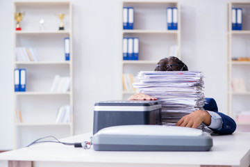 Wall Mural - Businessman making copies in copying machine