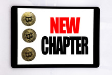 Writing Text Showing New Chapter. Business Concept For Starting New Future Life Written On Tablet Screen On The White Background With Cryptocurrency Bitcoin Next To It.