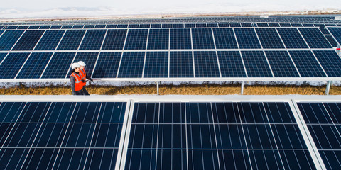 Wall Mural - solar power station worker