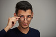 © PixieMe - Man putting glasses down