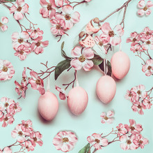 Easter Pastel Pink Pattern With Hanged Eggs And Decor Blossom On Turquoise Background