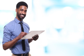 Young businessman in front of a blurred background