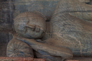 Wall Mural - Reclining Buddha statue at Gal Vihara rock temple in the ancient city Polonnaruwa, Sri Lanka