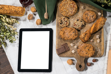 Fresh homemade sweet pastry with tablet