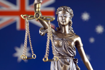 Symbol of law and justice with Australia Flag. Close up.