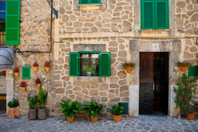 Beautiful Street In Valldemossa With Traditional Flower Decoration, Famous Old Mediterranean Village Of Majorca. Balearic Island Mallorca, Spain