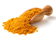 Turmeric Powder In The Wooden Scoop, Isolated On White
