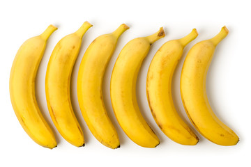 Wall Mural - Six bananas are in a row on a white background.