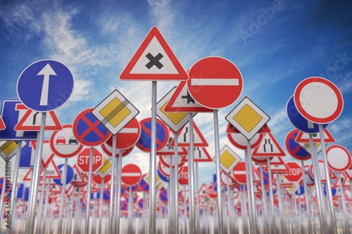 Cuadros en Lienzo Many road signs against blue sky. 3D rendered illustration.