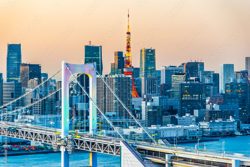 Asia Business concept for real estate and corporate construction - panoramic modern city skyline bird eye aerial view of Odaiba, tokyo tower & rainbow bridge under golden sun in Tokyo, Japan - obrazy, fototapety, plakaty 