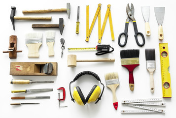 Flat lay of various technician tools isolated on white background