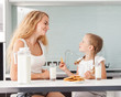 © Tatyana Gladskih - Child with mother drinking milk