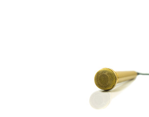 Gold Microphone on isolated white.