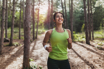 Wall Mural - Girl exercising in park