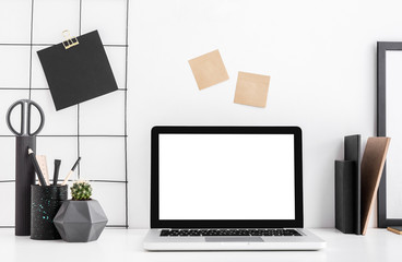 Canvas Print - Minimal home decor white workspace with laptop and office supplies, sticky notes and a cactus. Black and white color mock up.