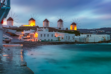 Famous View, Traditional Windmills On The Island Mykonos, The Island Of The Winds, At Cloudy Sunrise, Greece