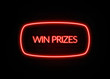 © zobaair - Win Prizes neon sign on brick wall background.