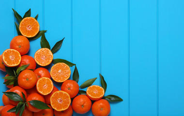 Wall Mural - Orange on wooden background.