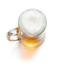 Wall Mural - mug of ligt beer with foam isolaed on white background