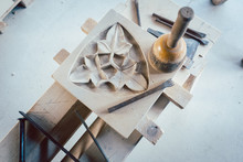 Tools And Stone Ornament In Workshop Of Stonemason