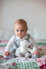 Canvas Print - Portrait of a cute  infant baby boy. Happy childhood concept.