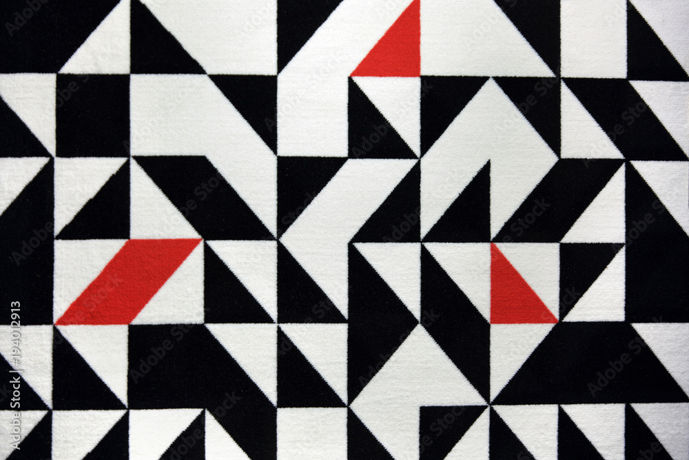 Piękny dywan, geometryczne wzory, białe, czarne i czerwone. - obrazy, fototapety, plakaty 