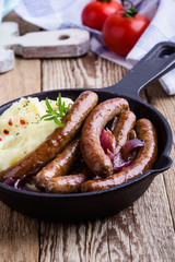 Canvas Print - Sausage and onion casserole with potato mash