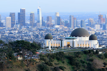 Canvas Print - Griffith Observatory Park with Los Angeles Skyline at Dusk. Twilight views of the famous monument and downtown from Santa Monica Eastern Mountains. Los Angeles, California, USA.