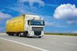 LKW auf einer Straße zum Transport von Waren in der Logistik // truck for shipping on highway 